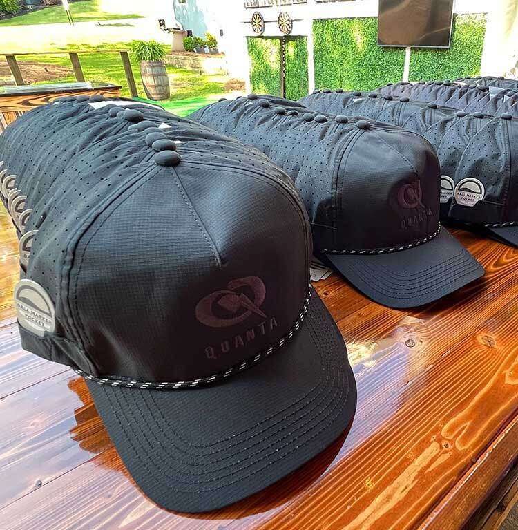 Baseball caps with the Quanta Logo