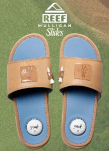 light blue and tan golf slides with tee holder and golf ball heel 