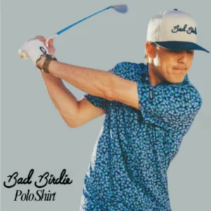 Man wearing Bad Birdie branded Polo Shirt in blue swinging a golf club.